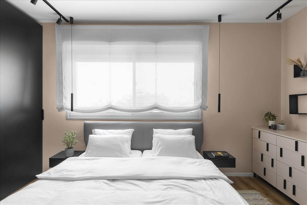 גופי תאורה תלויים בעיצוב מודרני בחדר השינה